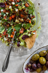 Salad with vegetables and olives. The cuisine of Tel Aviv.
