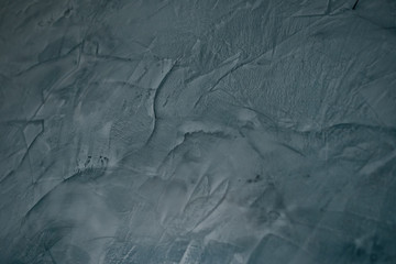 decorative plaster Venetian.The Venetian is painted on a wall of glossy gray