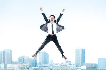 ジャンプするビジネスマン