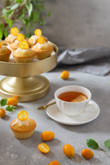 British afternoon tea party with lemon cupcakes. Bakery, patisserie, cafe menu concept. Copy space