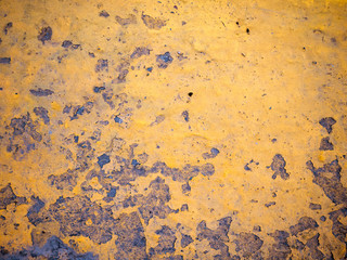 Cement floors that are yellow and black in color