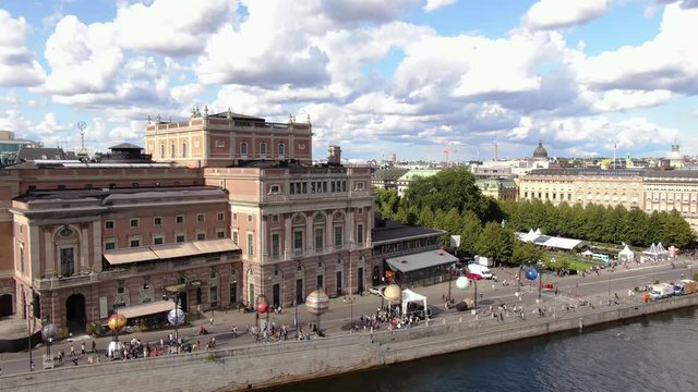 The Royal Swedish Opera and King's Garden, aerial rise from water. 