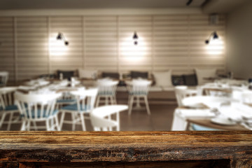 Desk of free space and blurred bar interior in restaurant 