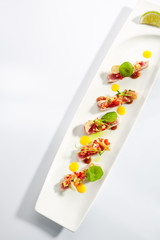 Appetizer with Tuna Tartar, Seasonal Vegetables and Greens
