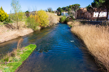 View of the Jalon River as it passes through the town of Sabinan, Aragon, Spain