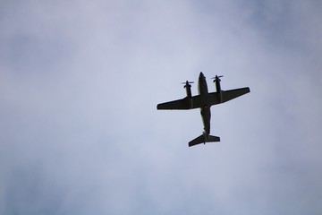 Twin Prop Airplane in the Sky