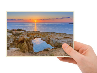 Hand and Famous stone Sin Bridge at sunrise in Ayia Napa Cyprus (my photo)