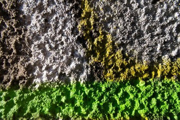 wall with rough texture and spray paint 