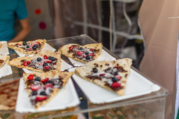 a perfect street snack for sweet tooth is a  berry pizza