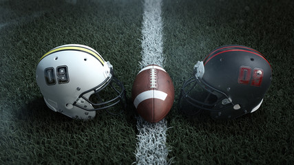 Naklejka na ściany i meble Two american football helmets and between them a american football ball on the field