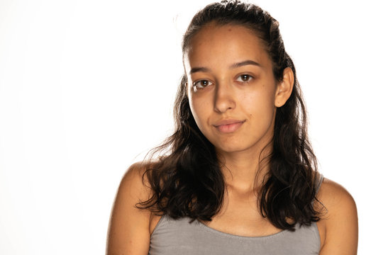 portrait of beautiful young latin woman without makeup