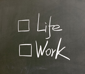choosing life,life or work concept on blackboard
