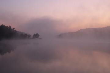 Fototapeta na wymiar Foggy lake in Hungarian lake.