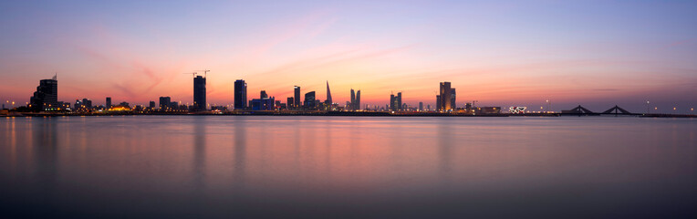 Naklejka premium A panoramic view of Bahrain skyline during sunset, Bahrain