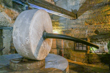 detail of old olive oil mill in Apulia, Italy