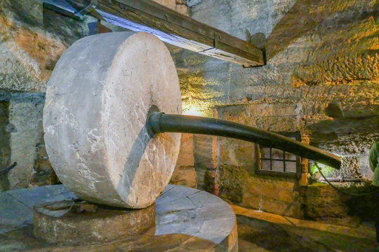 detail of old olive oil mill in Apulia, Italy