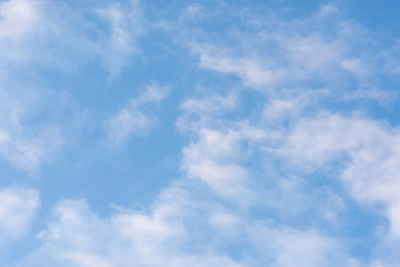 texture of the sky clouds and rays of sun on a background