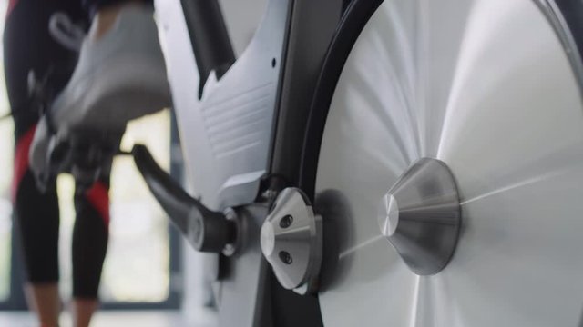 Close up of athlete working out with exercise bike.  Shot with RED helium camera in 8K 