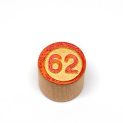 Wooden lotto barrels with numbers, bingo game. Board family game. Isolated on white background.