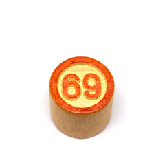 Wooden lotto barrels with numbers, bingo game. Board family game. Isolated on white background.