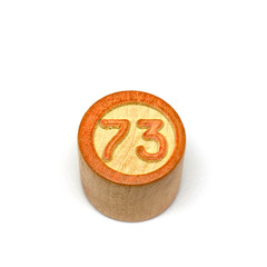 Wooden lotto barrels with numbers, bingo game. Board family game. Isolated on white background.