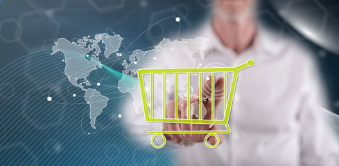 Man touching a global e-commerce concept