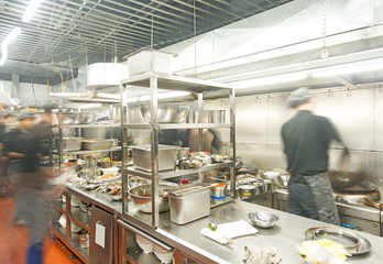 motion chefs of a restaurant kitchen