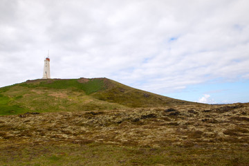 Fototapeta na wymiar lighthouse on the coast of Iceland, landmark