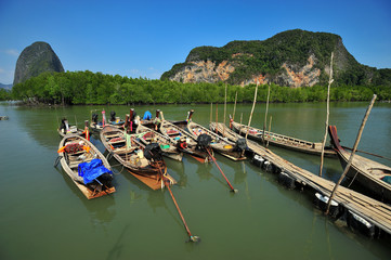 Fishing Boats background  the mountain view. Fishing boat for fishermen in southern Thailand.