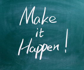 Make It Happen written in chalk on a used blackboard. Used in business, life and sports coaching this well known phrase or saying has become a rallying cry for getting things done.