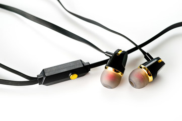 Black vacuum headphones with headset shot on a white background