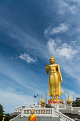 Translation on buddha image's feet text "Phra Buddha Mongkol Maharaj" is located on the hill at Hat Yai Municipality Park, Hat Yai district, Songkhla, Thailand.