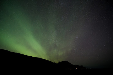 iceland aurora borealis northern lights night sky with moon and stars
