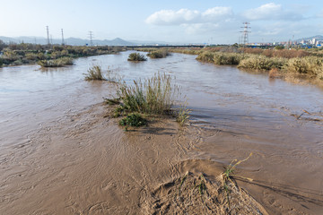 Flooded river, floods in the city, climate change