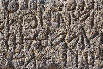 Ancient text on a stone fragment from the archaeological site of Safed fortress