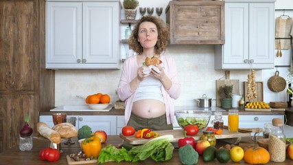 Beautiful Pregnant Woman Eating Burger