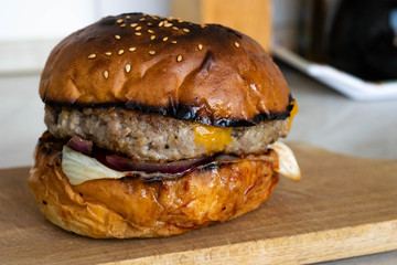 Homemade delicious pork hamburger with cheddar