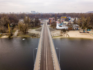 Aerial drone view. The bridge across the bay on the island of Hydropark in Kiev.
