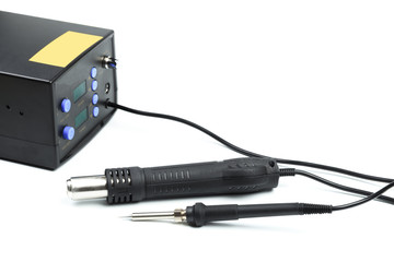 Soldering station with LED display, heating control regulator, with hot air gun and soldering iron. Isolated on a white background. - Image