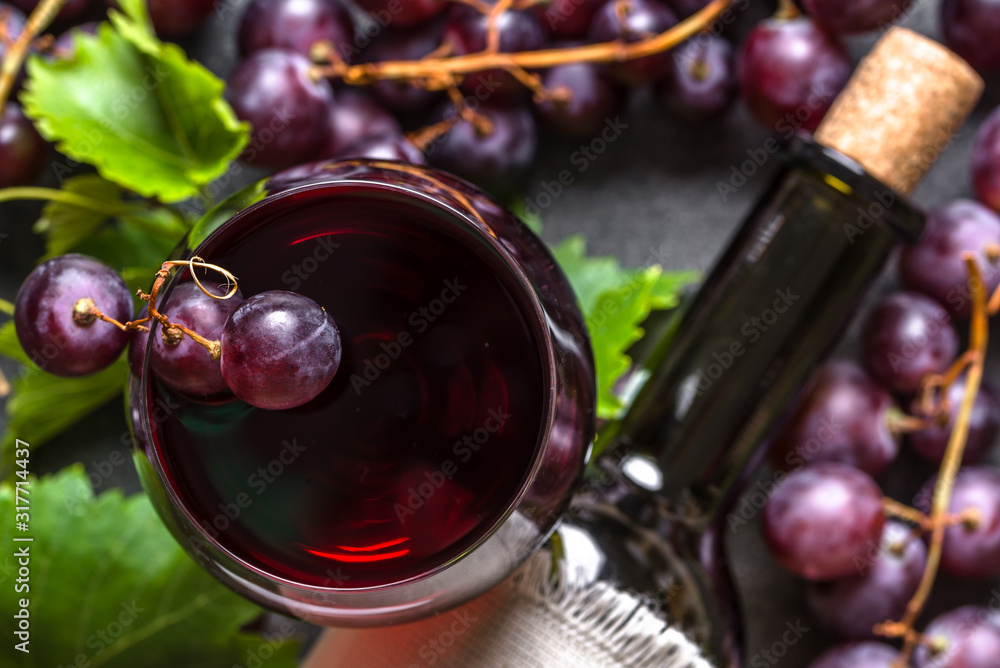 Wall mural red wine glass and bottle of wine, top view