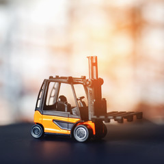 Forklift loader close up. Pallet stacker truck equipment at warehouse.