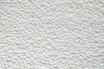 Construction and insulation material, white foam sheet, texture. A close-up. The background. - obrazy, fototapety, plakaty
