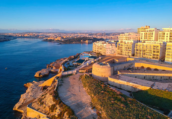 Obraz premium Beautiful aerial scenery of the rocky coast in Sliema, Malta