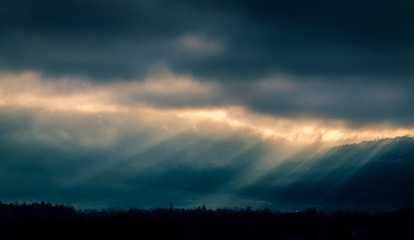 sunbeam through the clouds after a thunderstorm