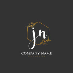 Handwritten initial letter J N JN for identity and logo. Vector logo template with handwriting and signature style.