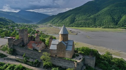 Aerial view of old Ananuri Fortress with two churches and picturesque view on river. Georgia.