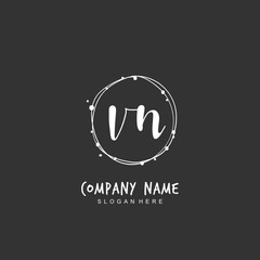 Handwritten initial letter V N VN for identity and logo. Vector logo template with handwriting and signature style.