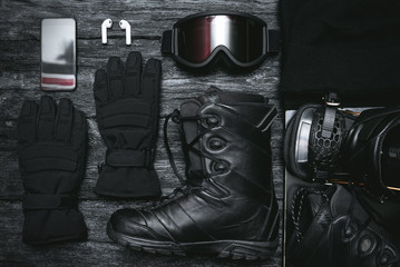 Snowboard equipment flat lay concept background.