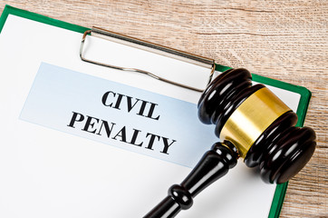 Civil penalty and gavel with document.