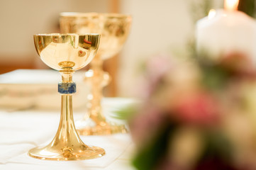 Golden Chalice with Reflection of a Wedding Bouquet